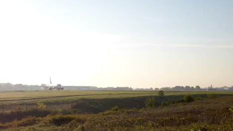 Ryanair-Plane-Taxiing-before-Takeoff-at-Leeds-Bradford-Airport-in-Yorkshire,-England-on-a-Sunny-Summerâ€™s-Morning