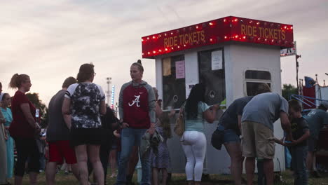 People-in-line-buying-tickets-for-carnival-rides-in-Pennsylvania