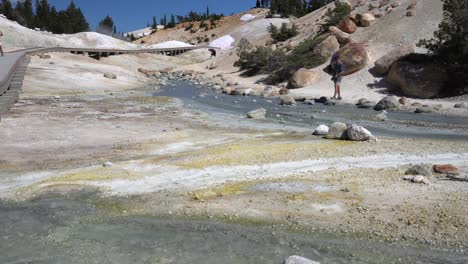 4K-video-of-boy-visiting-Bumpass-Hell-in-Lassen-Volcanic-National-Park,-California---July-28,-2019