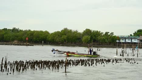 Fishing-Boat-with-trolling-implements-followed-by-another-boat