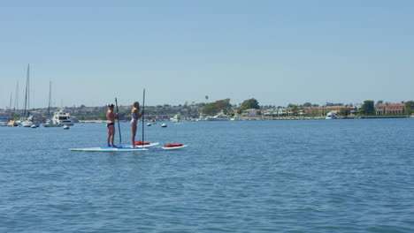 Slow-motion-Sailing-by-Stand-Up-Paddle-Boarders