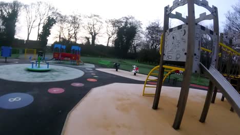 Recreational-colourful-children's-spooky-empty-playground-FPV-slow-motion-flying-aerial-view