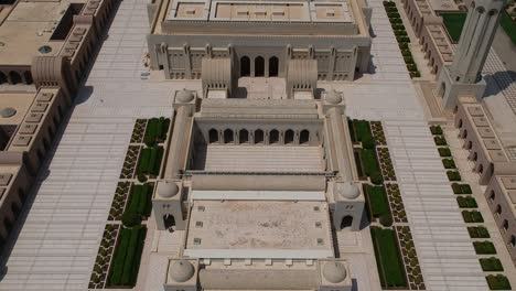 Reveal-and-establishing-aerial-drone-view-of-amazing-Sultan-Qaboos-Grand-Mosque-in-Muscat-in-Oman