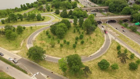 An-aerial-view-over-a-parkway-exit-on-a-cloudy-day