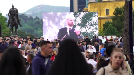 Eid-ceremony-in-center-of-Tirana,-large-crowd-of-people-attending-the-event