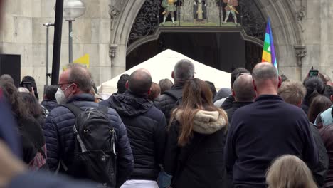 A-group-of-people-standing-and-waiting-for-something-to-commence