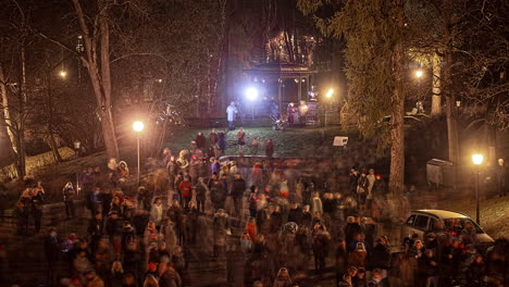 Latvian-citizens-gathered-at-night-to-celebrate-the-Proclamation-Day-of-the-Republic