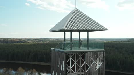 AERIAL:-Rotating-Shot-of-Birštonas-Observation-Tower-During-Sunny-Evening