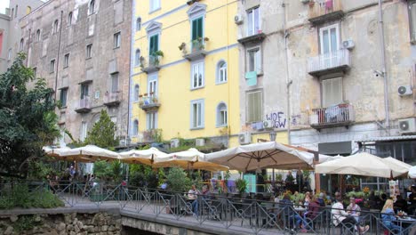 People-Enjoying-The-Food-And-Ambience-Of-Bellini-Square-In-Naples,-Italy