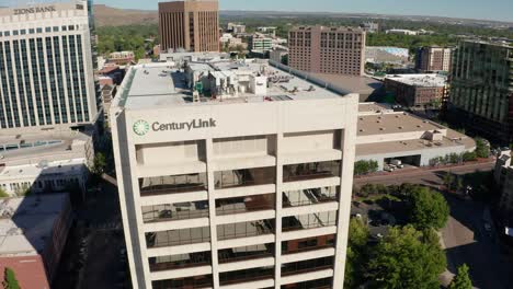 Wide-orbiting-aerial-shot-of-the-CenturyLink-building-in-Boise,-Idaho