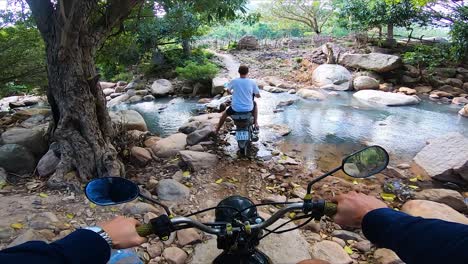 Driving-motorcycle-in-Nui-Chua-national-park-trail,-Vietnam