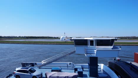 Vehicle-On-Deck-Of-Barge-With-Intermodal-Containers-Sailing-At-Noord-River-In-Netherlands