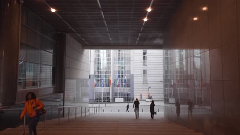 POV-walking-through-the-corridor-tunnel-of-the-European-Parliament-in-Brussels,-Belgium