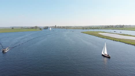 Aerial:-4K-view-of-sailboats-on-Netherlands-Kaag-Lakes-on-summer-day