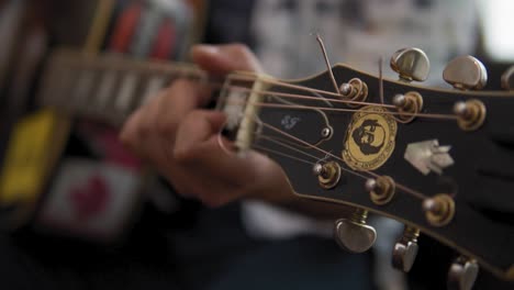 Musician-playing-the-guitar-during-a-live-performance