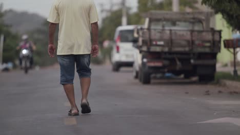 Native-elderly-man-taking-a-stroll-through-the-city-of-Corumba