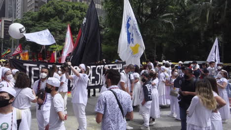 Masked-crowd-at-large-Black-Consciousness-Rally-in-Sao-Paulo,-Brazil