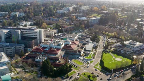 The-Brock-Fahrni-Pavilion-at-the-Women's-Health-Centre-in-BC-Children's-Hospital,-Vancouver-British-Columbia-Canada---aerial-orbit-in-UHD-on-a-sunny-day