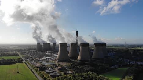 Drone-footage-flying-towards-Drax-Power-Station-in-Drax-Village-near-Selby,-Yorkshire,-UK