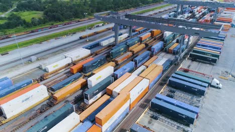 4K-Drone-Video-of-Trains-and-Trucks-at-CSX-Intermodal-Train-Yard-in-Winter-Haven,-FL