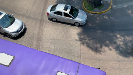 Overhead-View-Of-Morning-Traffic-Going-Past-On-Avenue-Patriotismo-In-Mexico-City