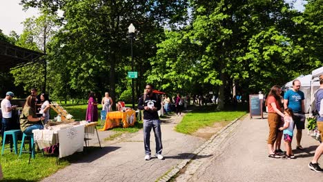 Young-African-American-preaches-at-the-Farmer's-Market-in-Portland,-Maine