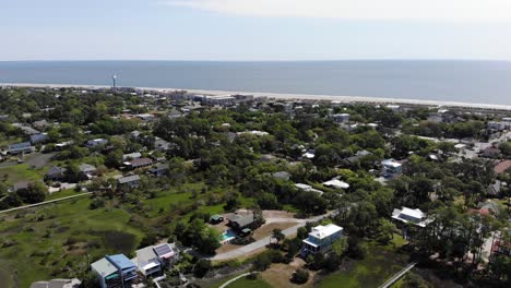 tybee-island-georgia-water-tower-houses-beach-community-trees-aerial-drone