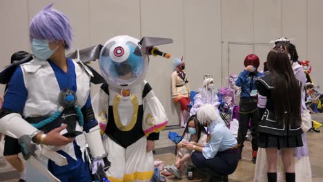 Visitors-and-participants-dressed-up-as-cosplayers-are-seen-during-the-Anicom-and-Games-ACGHK-exhibition-event-in-Hong-Kong