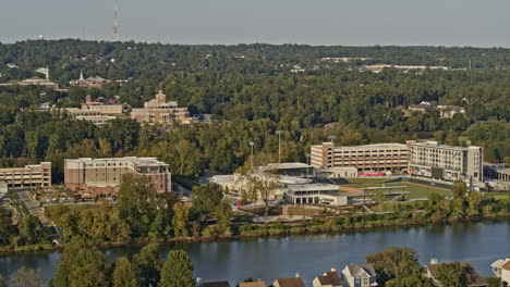 Augusta-Georgia-Aerial-v9-circular-pan-shot-overlooking-at-srp-park,-residential-apartments-and-downtown-cityscape-on-other-side-of-savannah-river---Shot-with-Inspire-2,-X7-camera---October-2020