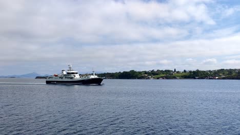 Unique-high-capacity-factory-ship-and-live-fish-carrier-Norwegian-Gannet---Sailing-through-Leroyosen-heading-for-Hirtshals-Denmark-with-Norwegian-farmed-salmon