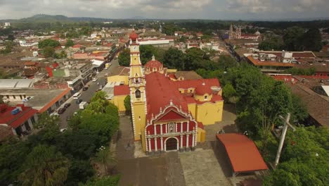 Spectacular-aerial-view-with-drone-of-the-central-Church-of-the-magical-town-Coatepec,-Veracruz