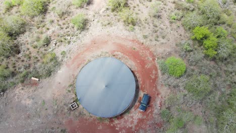 Drone-Mavic-Air-2-flying-over-the-hill-in-the-Africa-savanna-desert-zone