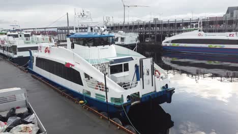 High-speed-passenger-express-boat-named-Rygerfjord-from-Rodne-company-is-alongside-dock-in-Stavanger-Norway---Aerial