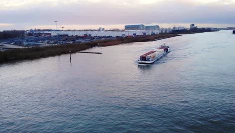 Delta-Hopper-Inland-Freighter-Carrying-Cargo-Containers-Along-Oude-Maas