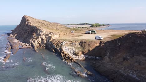 Motorhomes-and-Camper-Vans-Sleeping-Place-at-Porto-Novo-Beach,-Albania