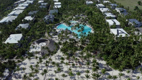 Catalonia-Bavaro-hotel-resort-with-swimming-pools-and-palm-beach,-zoom