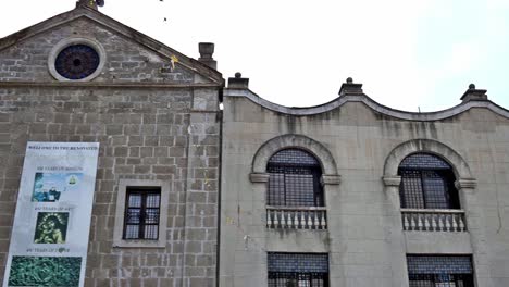 Editorial-illustrative-low-angle-view-of-the-centuries-old-San-Agustin-church-in-Intramuros,-Manila-showing-its-rich-Spanish-architectural-character