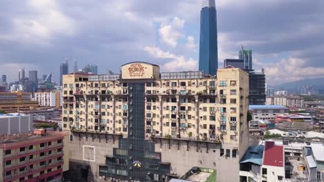 Drone-shots-of-Kuala-Lumpur-skyline-with-skyscrapers,-Malaysia,-UHD