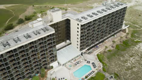 Shell-Island-Beach-front-resort-high-angle-aerial-over-pool