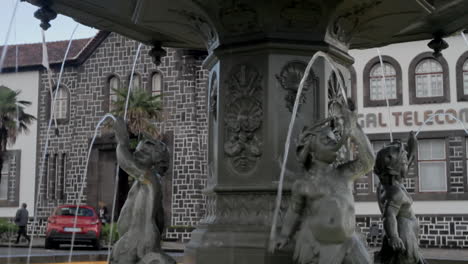 A-small-square-in-Ponta-Delgada,-with-a-small-water-fountain-in-the-middle