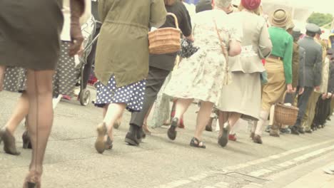 D-day-memorial-people-marching-in-the-street