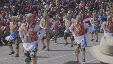 Slow-motion-footage-of-Virgen-del-Carmen-dancers-in-traditional-clothing-in-Cusco,-Peru