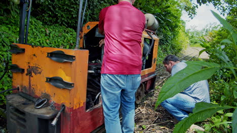 Swiss-Captain-Operating-old-fashioned-train-in-La-Fortuna---Costa-Rica