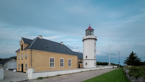 Timelapse-of-clouds-moving-over-a-lighthouse-with-changing-in-the-morning