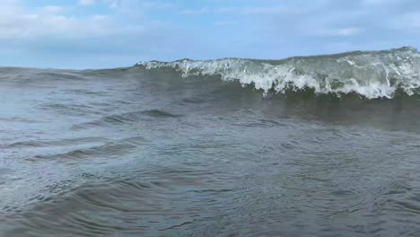 ocean-sea-waves-and-camera-under-water-at-cedar-point-beach-The-Shores-of-the-Lake-Erie-in-Sandusky,-Ohio,-united-states