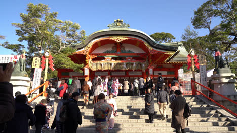 Kyoto,-Japan,-circa-:-Red-Torii-gates-at-Fushimi-Inari-Taisha-with-tourists-in-Kyoto-Japan