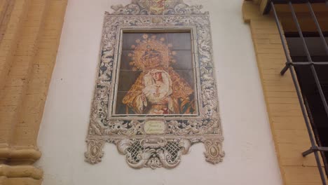 Ceramic-tile-painting-Virgen-Mary-de-Gracia-y-Esperanza-on-Church-exterior-wall