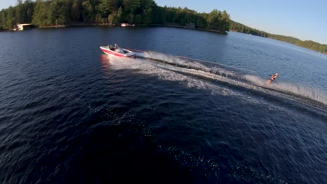 Slow-Motion---Slalom-Waterskiing-Caucasian-Man-Waves-At-Drone