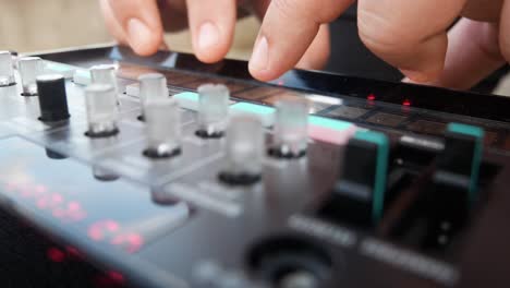 Girl-plays-analogue-electronic-musical-loop-synth-instrument-on-open-air-concert