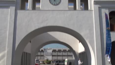 Tilting-down-from-the-flag-atop-the-iconic-Bab-al-Bahrain---the-entrance-gate-to-the-old-traditional-souq